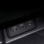 Close-up of Toyota Harrier dashboard featuring multiple charging ports