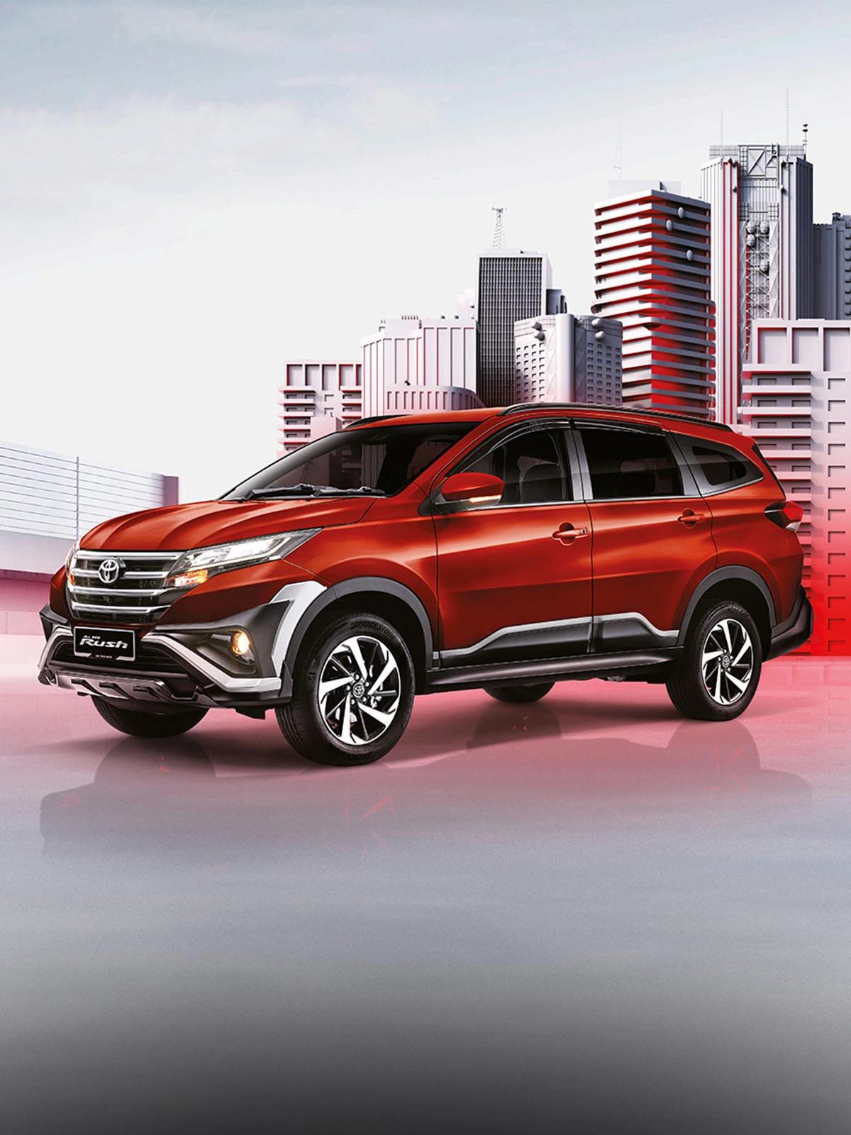 Modern Toyota Rush exterior design featuring bold front grille and alloy wheels in contemporary urban setting