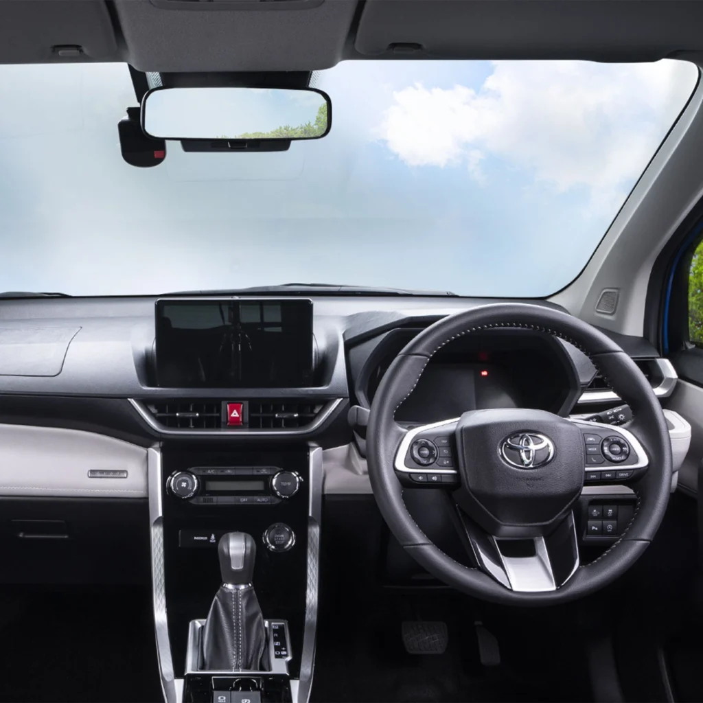 Toyota Veloz complete interior dashboard view with steering wheel, touchscreen display and center console